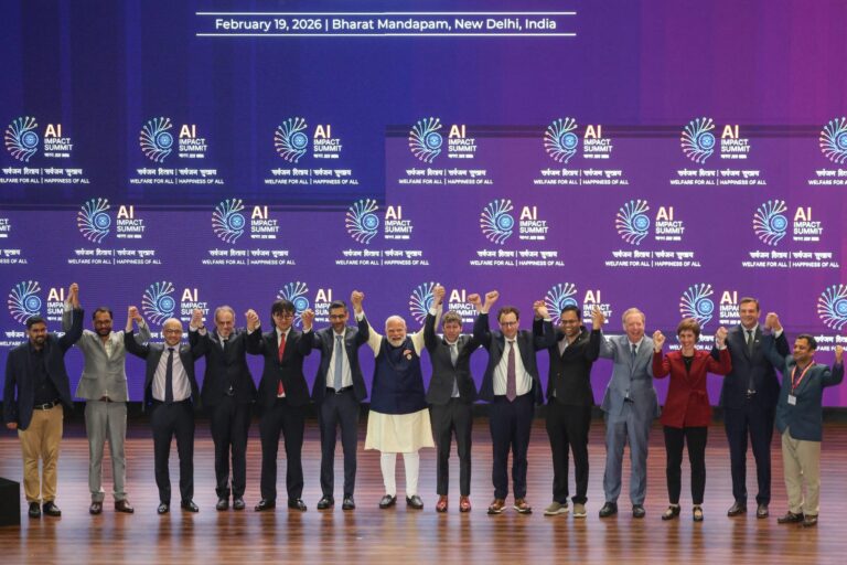 Inside India’s AI Summit: Robot fraud, gridlocked roads, shirtless protests, and an AWOL Bill Gates