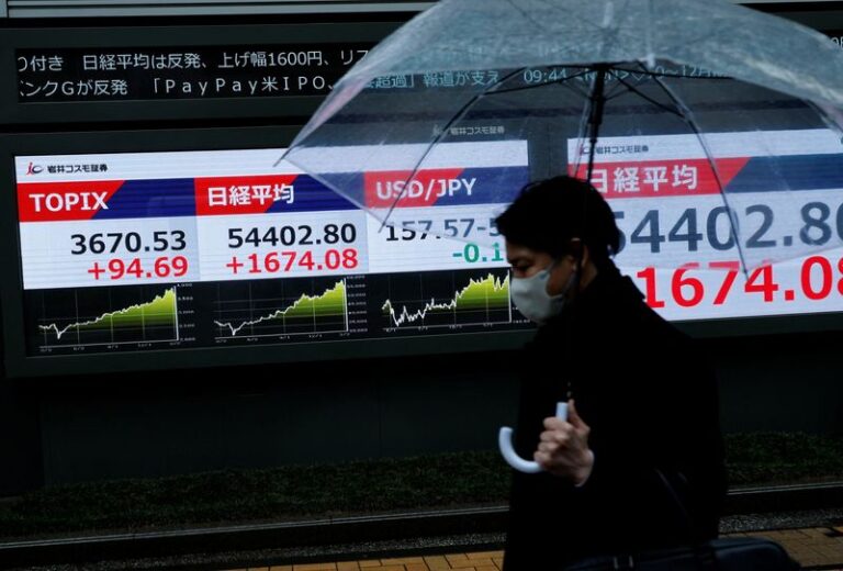Stocks slide in Asia, Brent crude heads for record monthly rise