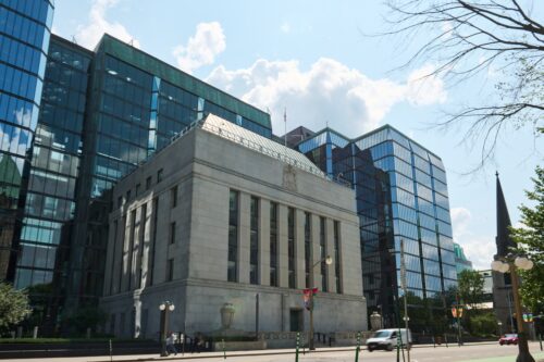 Bank of Canada holds rates at 2.25% as outlook improves