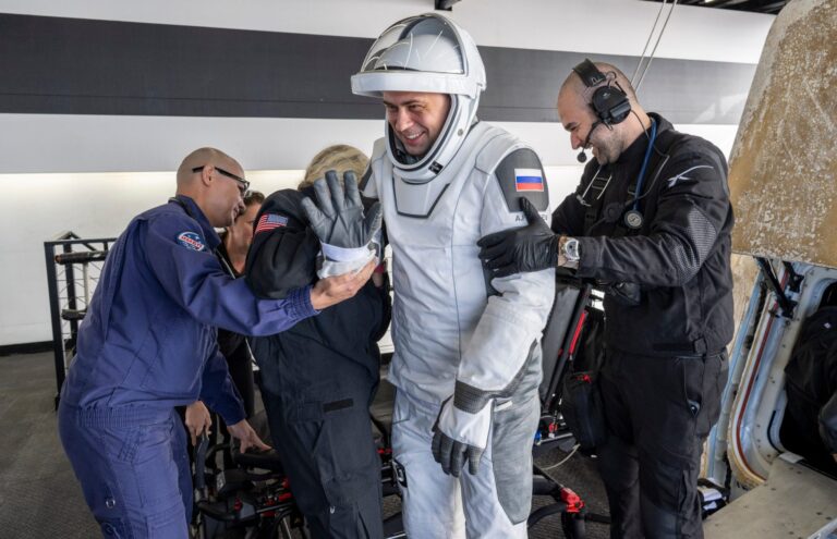 SpaceX’s recovery ship brought back four astronauts to Earth after an eight-month mission